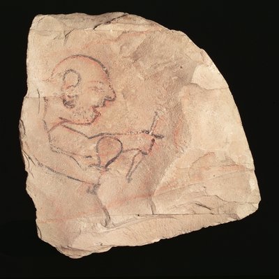 Ostracon depicting an unshaven stonemason by New Kingdom Egyptian